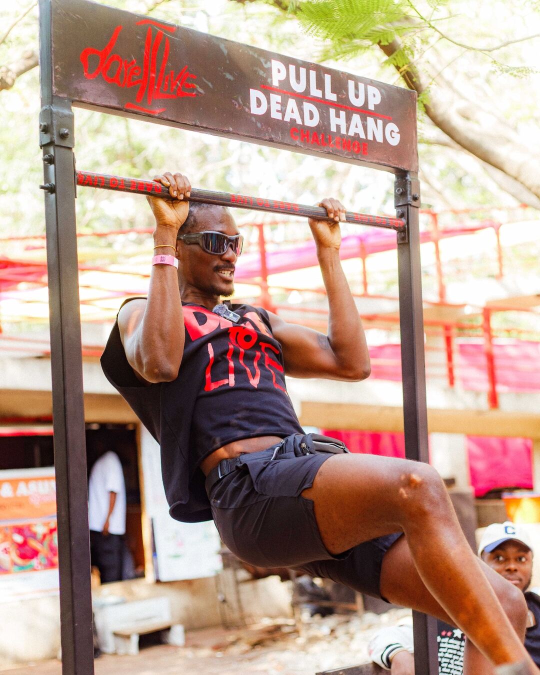 Dare To Live pull up dead hang challenge participant